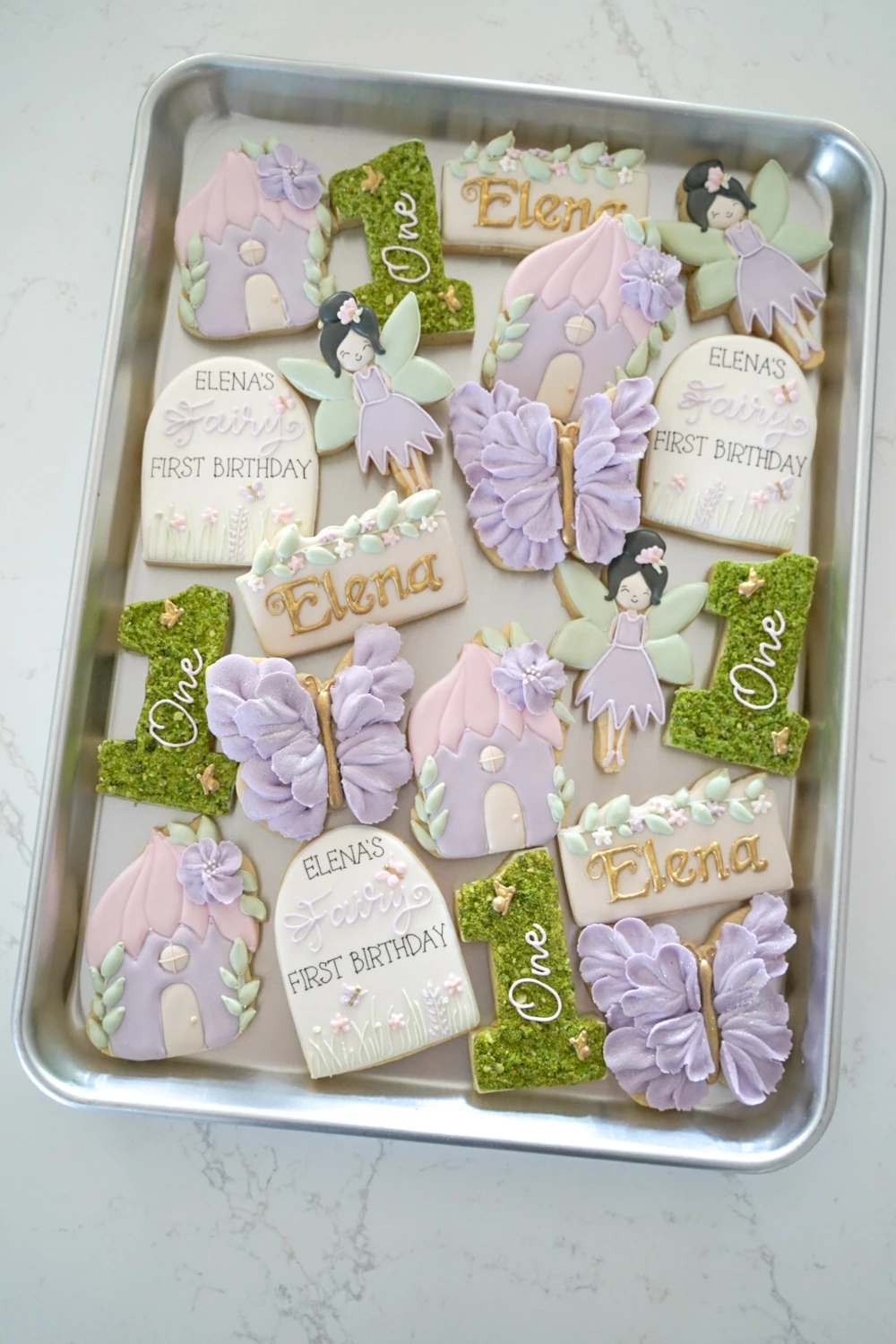 Lavender and green cookies with crowns and dresses