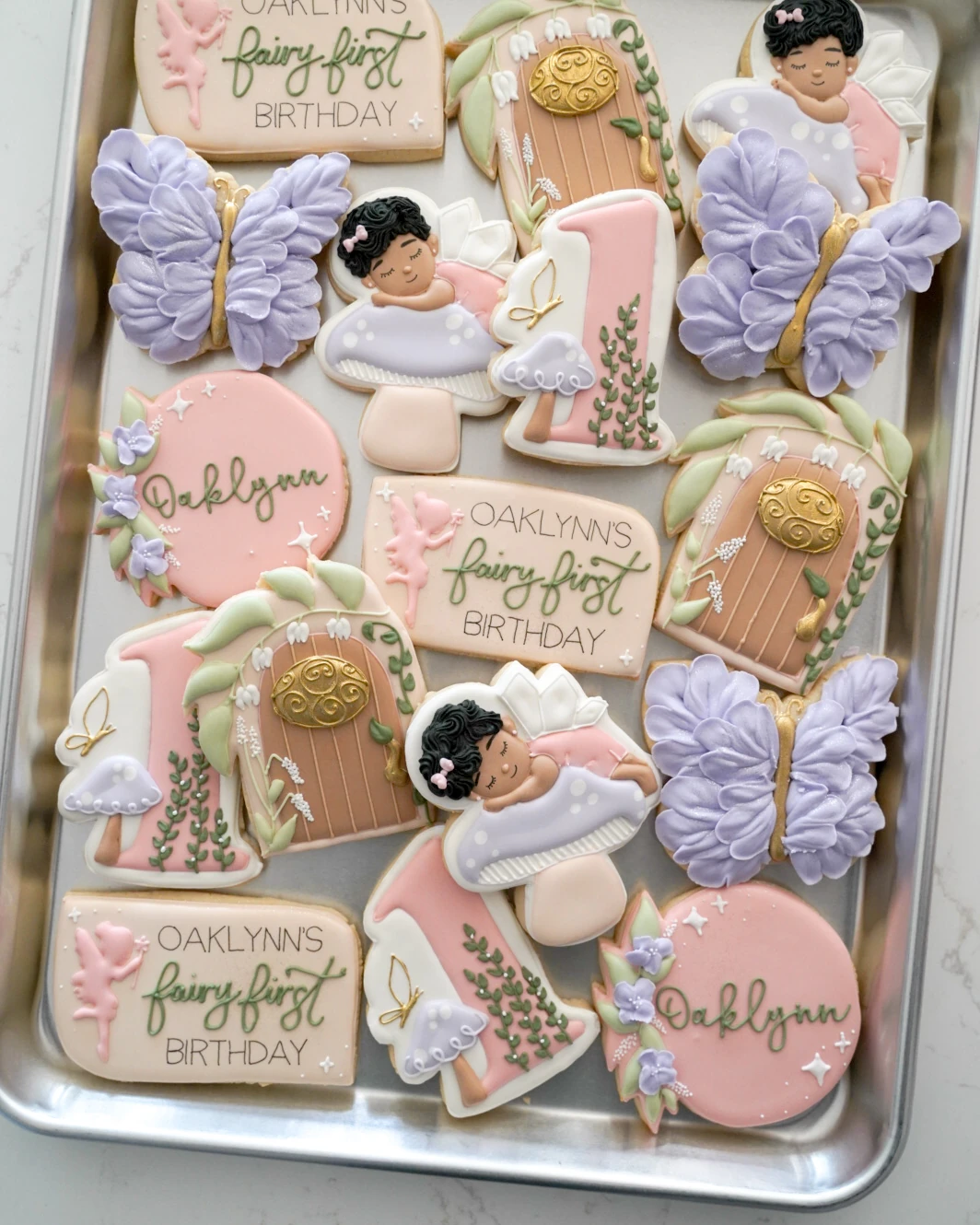 Pastel butterfly and fairy first birthday cookies
