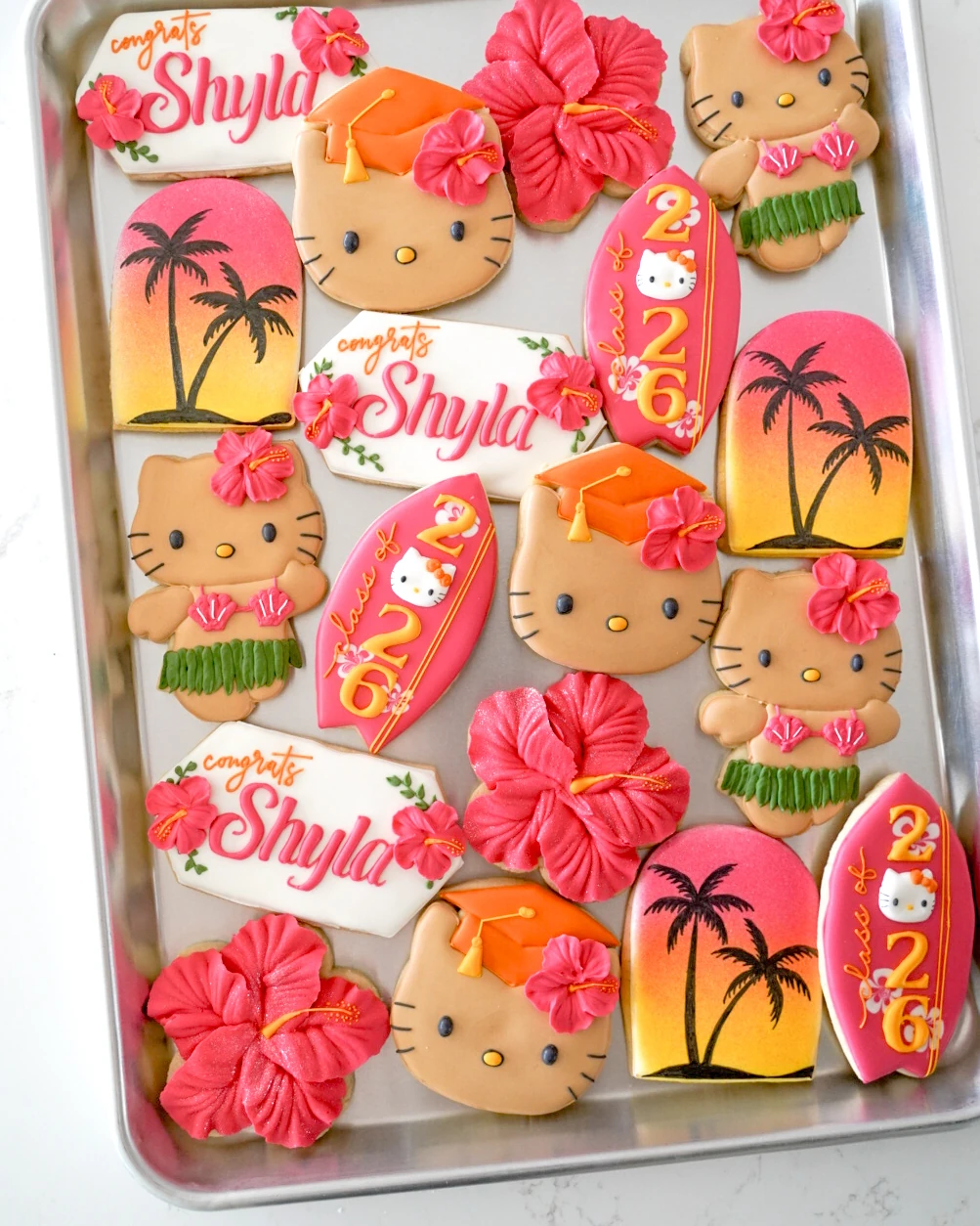 Tropical birthday cookies with hibiscus flowers