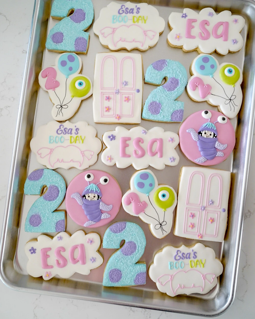 Pastel monster second birthday cookies