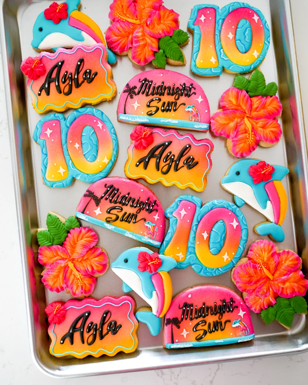 Bright tropical tenth birthday cookies