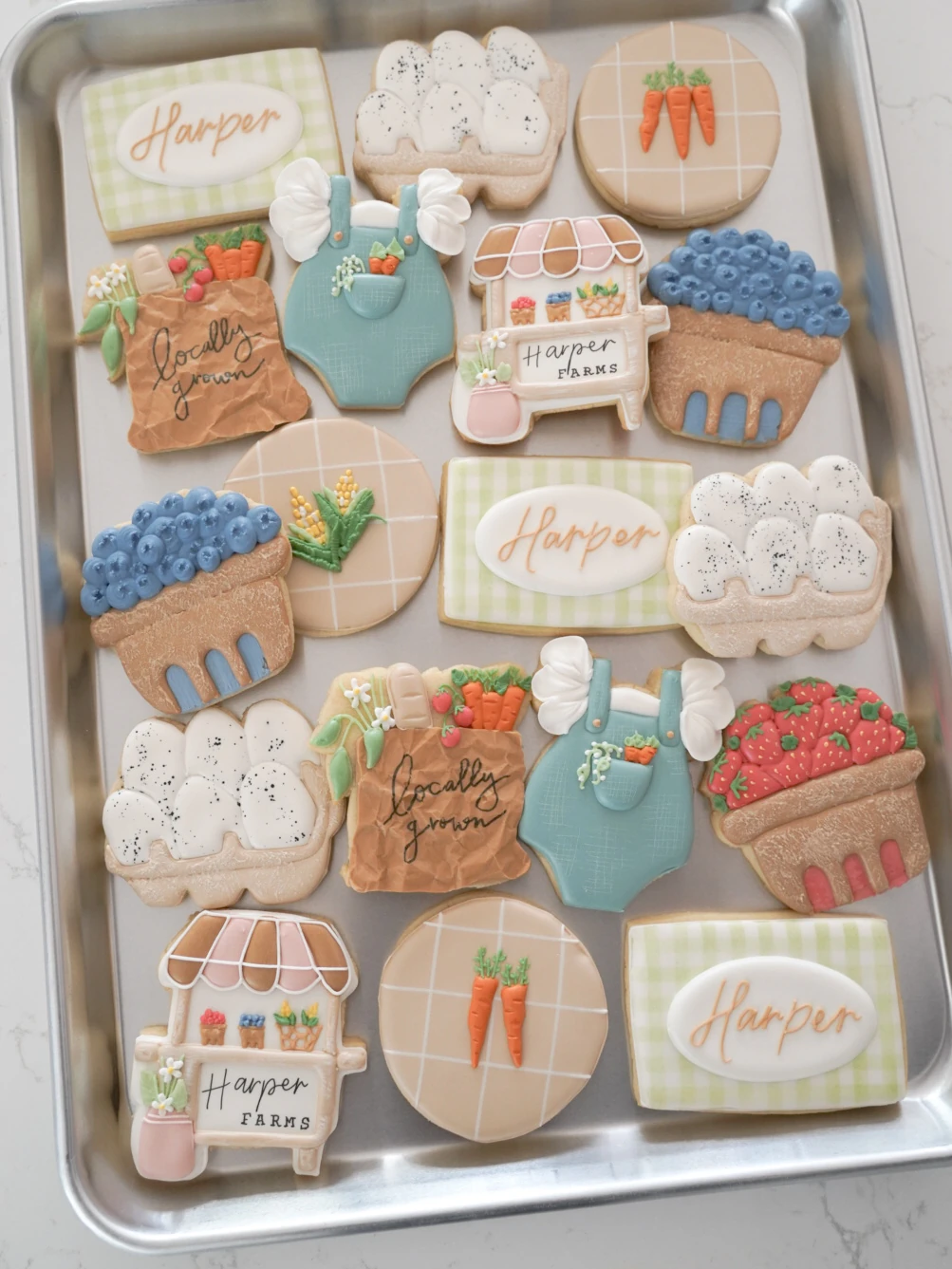 Neutral first birthday cookies with books and teddy bears